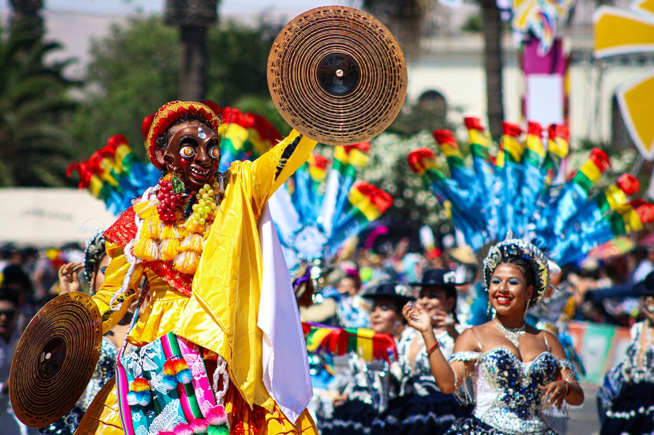 Colorful carnival with costumed dancers and cultural flair in Arica, Chile.