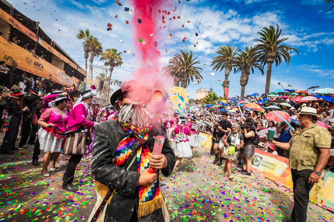 Colorful carnival in Arica, Chile with festive dancers, music, and cheerful crowds